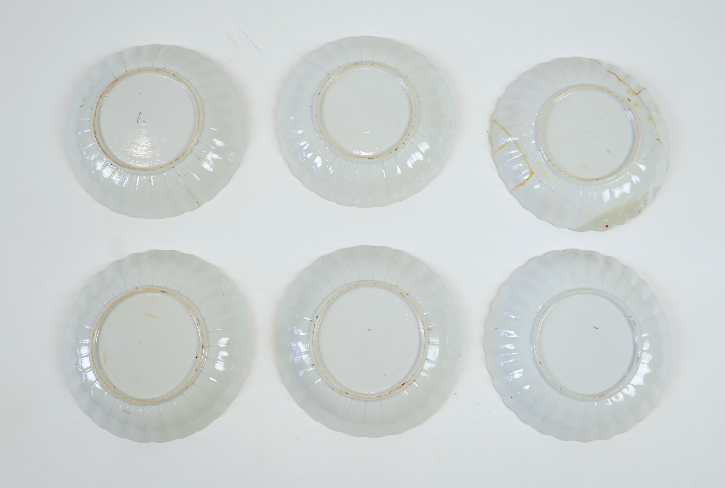 A set of six Chinese famille verte petal lobed saucer dishes, Kangxi period